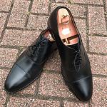 Click image for larger version.&nbsp;

Name:	Black-Cap-Toe-Oxfords-On-Brick.jpg&nbsp;
Views:	139&nbsp;
Size:	12.1 KB&nbsp;
ID:	167283